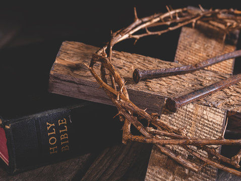 Cross and Crown of Thorns With Holy Bible