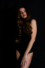 Fototapeta na wymiar High sexy brunette lingerie studio portrait