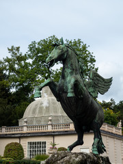 Fototapeta premium Salzburg, Austria - Oct 10th, 2019: Pegasusbrunnen or, .Pegasus fountain the fortress, salzburg