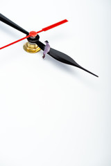 High angle view of people figure on pointer of clock on white surface with copy space, concept of aging