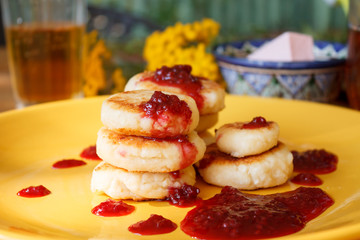 Cheese Pancake with raspberry sauce