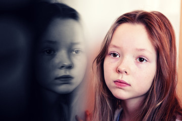 Portrait of a girl and her reflection