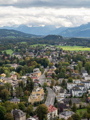 Naklejka premium Leafy Nonntal is an affluent residential area known for medieval Stift Nonnberg, a hillside Benedictine monastery with 12th-century frescoes.
