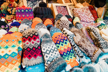 Fototapeta na wymiar Colorful woolen mittens Riga Christmas Market