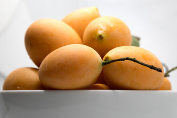 Heap of Thai plango fruit or marian plum, Fresh ripe Marian Plum