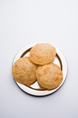 Aloo Puri or Potato curry with fried Poori, popular Indian breakfast / lunch / dinner menu.