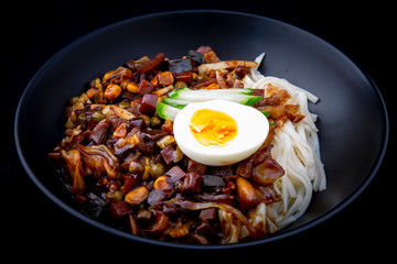 Jajangmyeon, noodle dish topped with black sauce