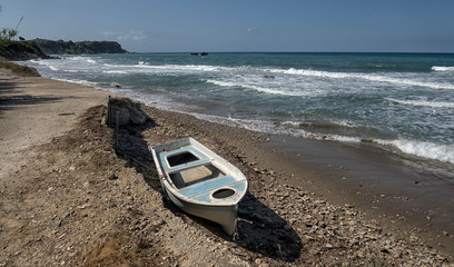 Fototapeta na wymiar Beautiful beach and boat, Corfu island, Greece
