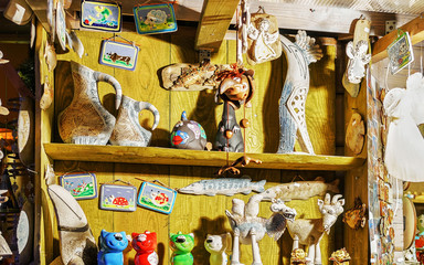 Ceramic toys on shelf during the Riga Christmas market
