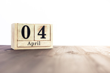 April 4th, fourth month of the clendar - copy space for text next to April symbol