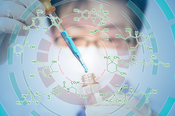 Asian male researchers are developing new drugs. Medical concept.