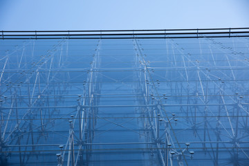A building with a glass facade in the center of Lublin in Poland.