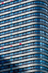 glass office building facade with windows, texture, architecture