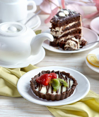 fruit cake and a piece of cake with tea
