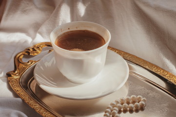 Morning coffee. morning. Black coffee in white mug.