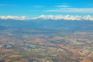 Turin suburb scenery with Alps mountains