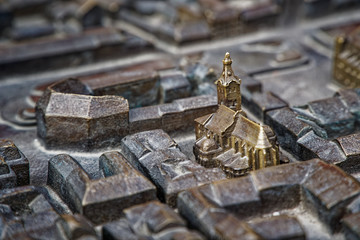 Lviv city in steel miniature. Old monument castle and church miniature - 331209789