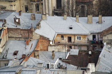 Lviv panorama. Aerial view on the old roof in centre of Lviv in Western Ukraine, with on the left the Uspensky church and on the right the Dominican church and the Town Hall