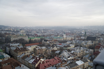 Fototapeta na wymiar Lviv panorama. Aerial view on the old centre of Lviv in Western Ukraine, with on the left the Uspensky church and on the right the Dominican church and the Town Hall