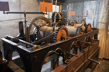Old tower clock mechanism with many gears