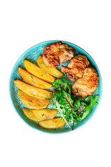 fried chicken and potatoes, keto or paleo diet menu concept food background. top view. copy space for text