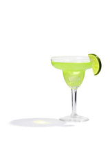 Margarita cocktail with ice cubes is contained in a margarita glass with a lime slice and salt on the rim. The showy illustrative picture is made on the white background.