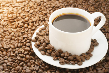 coffee cup with coffee beans. free copy space for your text