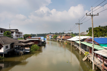 View landscape of Amphawa river and cityscape of Amphawa town and life thai people in amphawa floating market in weekday in Samut Songkhram, Thailand