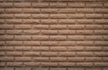 Geometric pattern on the wall in the shape of an old brick