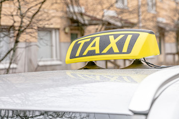 Detail of a taxi on the street.