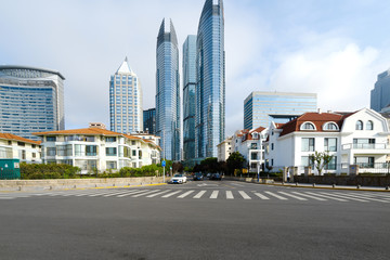Obraz premium empty highway with cityscape and skyline of qingdao,China.