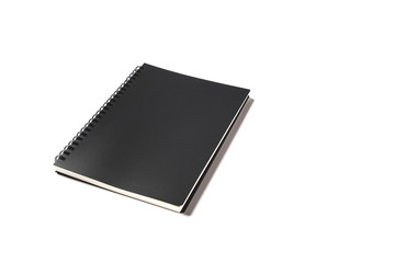 Close up black sketch book on white background