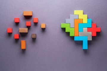 The concept of rational and irrational thinking. Colourful shapes of abstract brain for concept of...