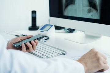 doctor man using a digital tablet