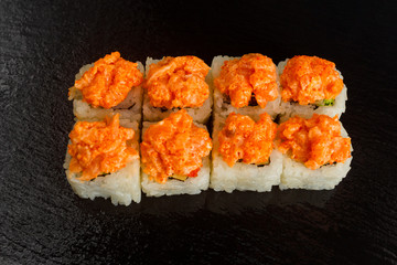 Japanese food: Set of salmon sushi and rolls with salmon and eel