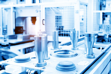 The steel cylindrical parts are on the machine platform