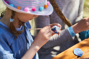 Workshop of decorating easter eggs  in beautiful hungarian village Holloko