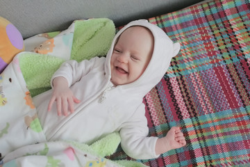 Portrait of baby awake, looking at the camera