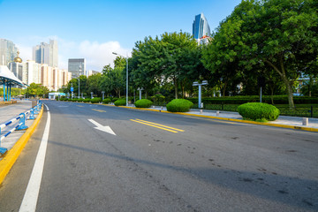 empty highway with cityscape and skyline of qingdao,China.