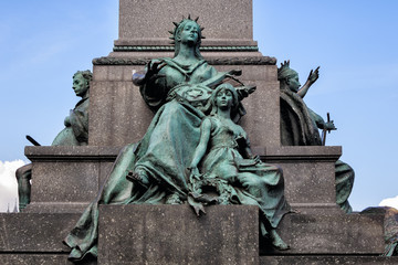 Fragment of the Adam Mickiewicz monument on Main Square in the Old Town of Krakow