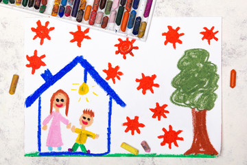 Photo of colorful drawing: Coronavirus epidemic. Stay at home. Mother and son in a house.