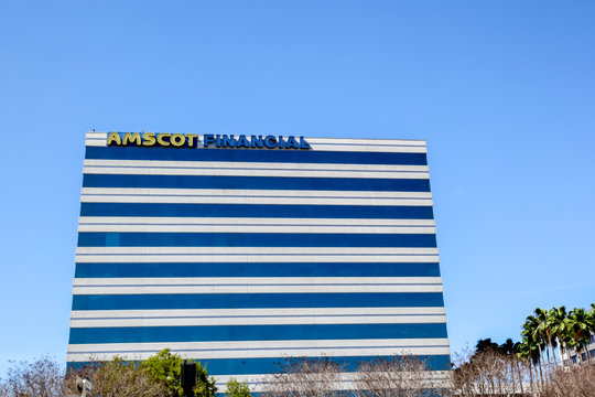 Tampa, Florida, USA - February 23, 2020: Sign of Amscot Financial on the headquarters building in Tampa, Florida, USA. Amscot is Florida's leading non-bank financial services company.