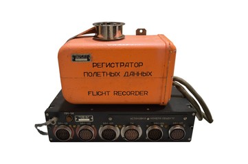 Old russian flight recorder isolated on white.