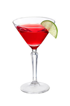 Cosmopolitan cocktail is contained in a martini glass with a lime slice on the rim. The showy illustrative picture is made on the white background.