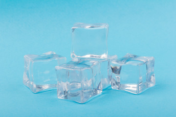ice cubes in close-up on blue background
