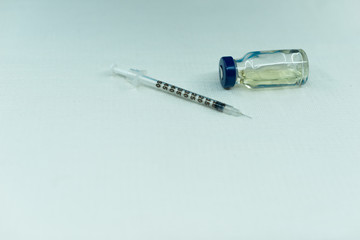 Diabetes vaccine insulin medical syringe on a white background