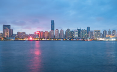 Fototapeta na wymiar Beach and beautiful city skyline at night, Qingdao, China