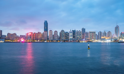 Fototapeta na wymiar Beach and beautiful city skyline at night, Qingdao, China