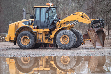 Image of excavator working on a construction site