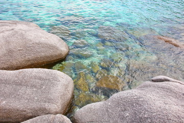 nature display big and small brown rock on beach and under water abstract background,copy space.